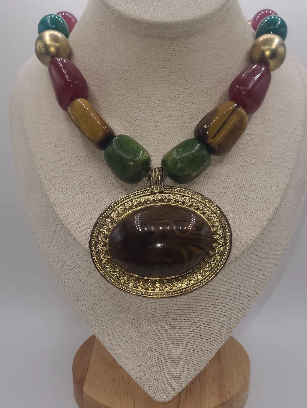 Multicolor Beaded Statement Necklace with Gold Oval Pendant